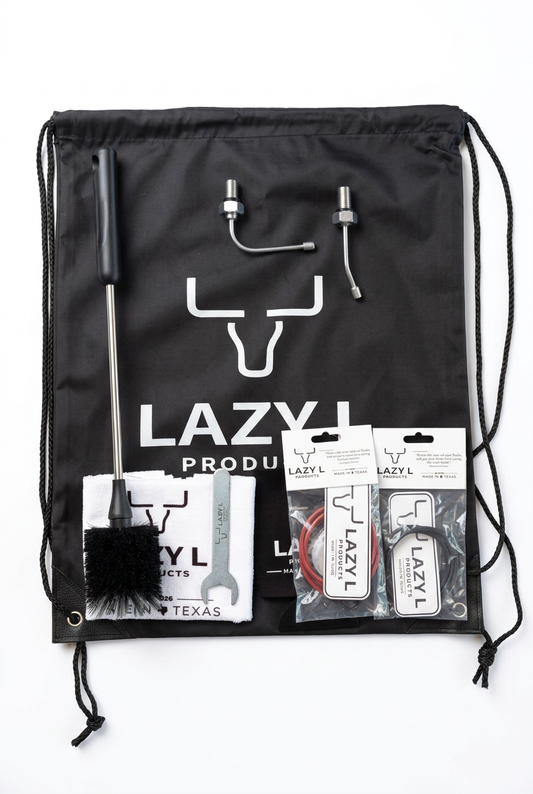 Goat Nozzle Kit with straight and side goat nozzles, Lazy L bag, cleaning tools, and packaged accessories on a white background